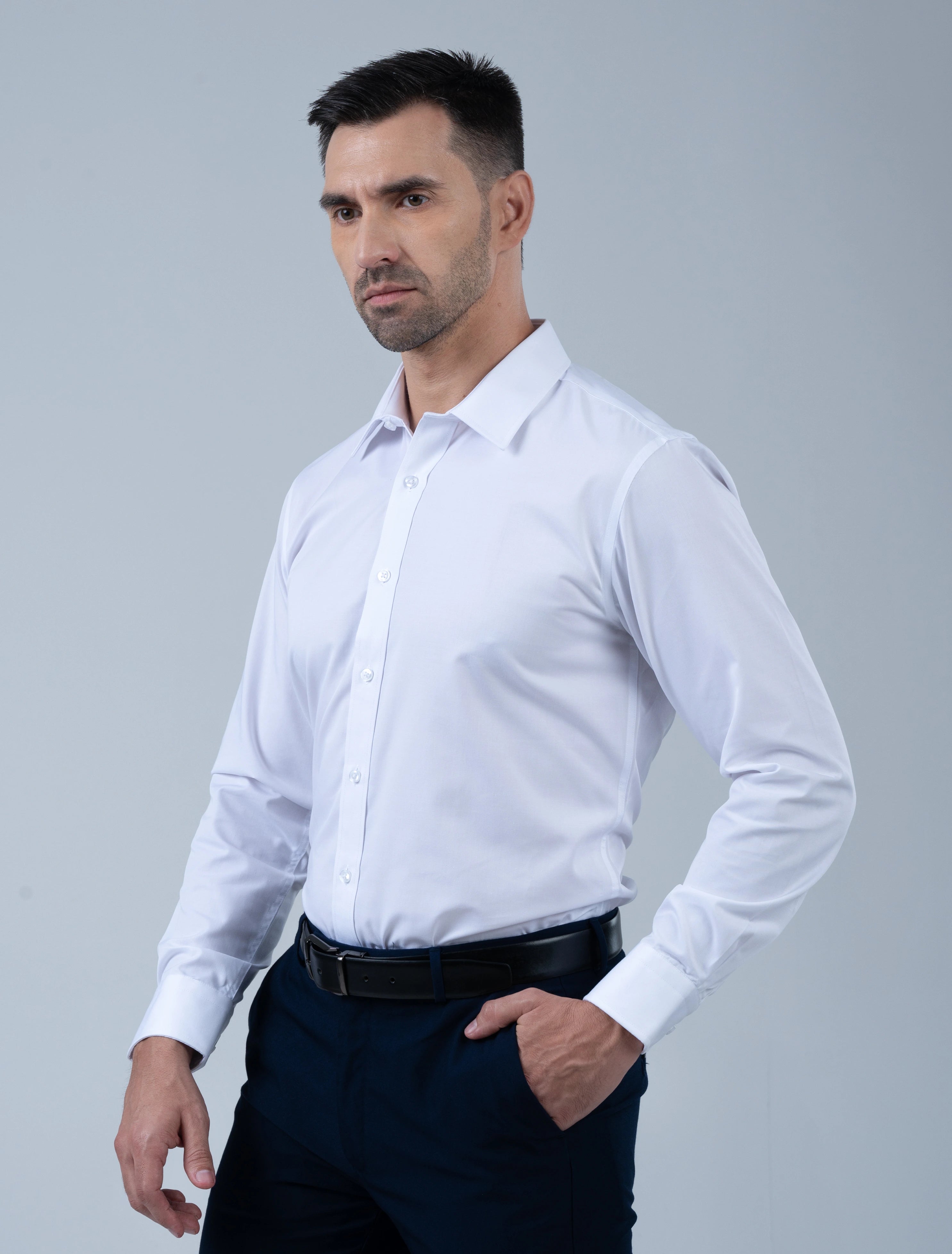 Model wearing the Marshall Menswear Cambridge premium white men's dress shirt featuring a tailored silhouette, crisp collar and refined business attire.