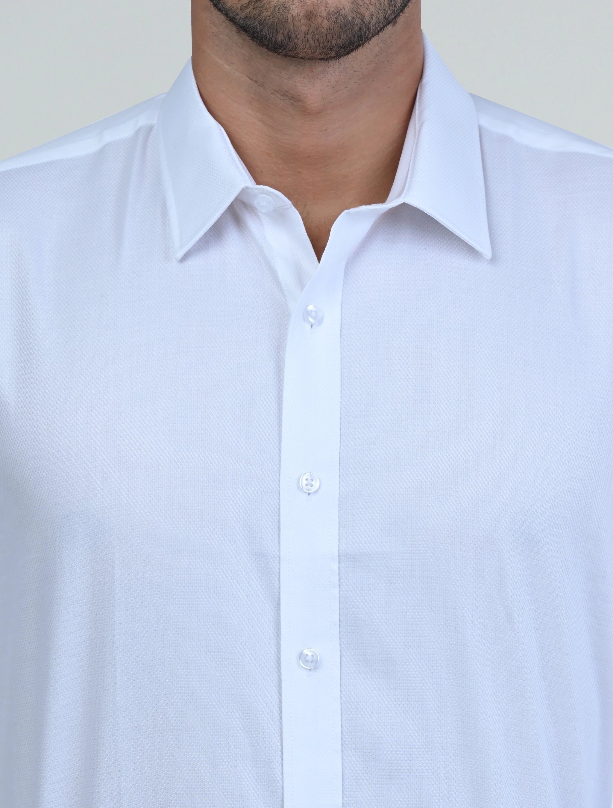 Close-up of the Marshall Menswear Monaco White men's Egyptian cotton dress shirt highlighting the smooth Egyptian cotton weave, premium buttons and refined collar construction.
