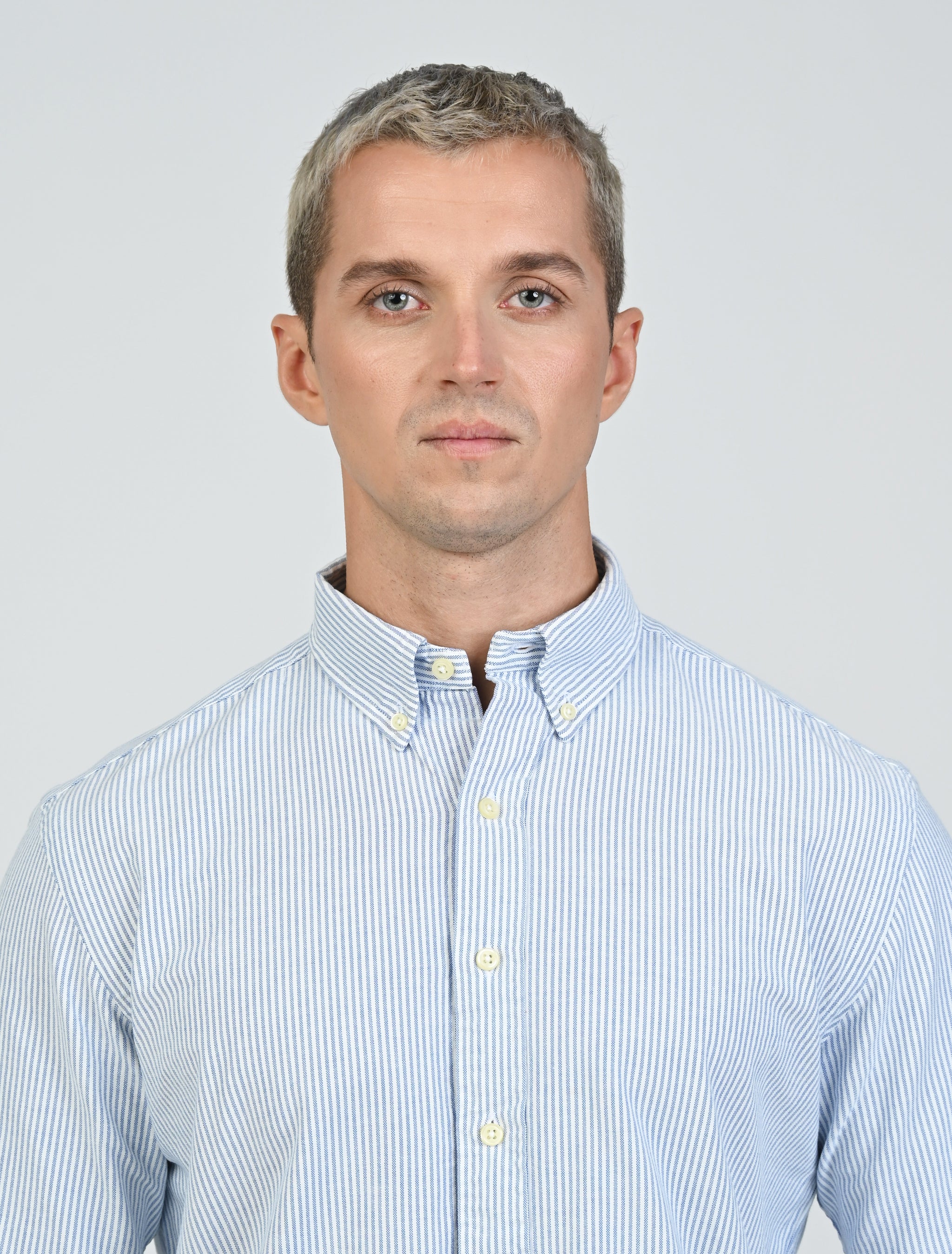 Close-up of the Marshall Menswear Marlowe Stripe men's cotton Oxford shirt showcasing blue and white stripes, a button-down collar and premium Oxford fabric.