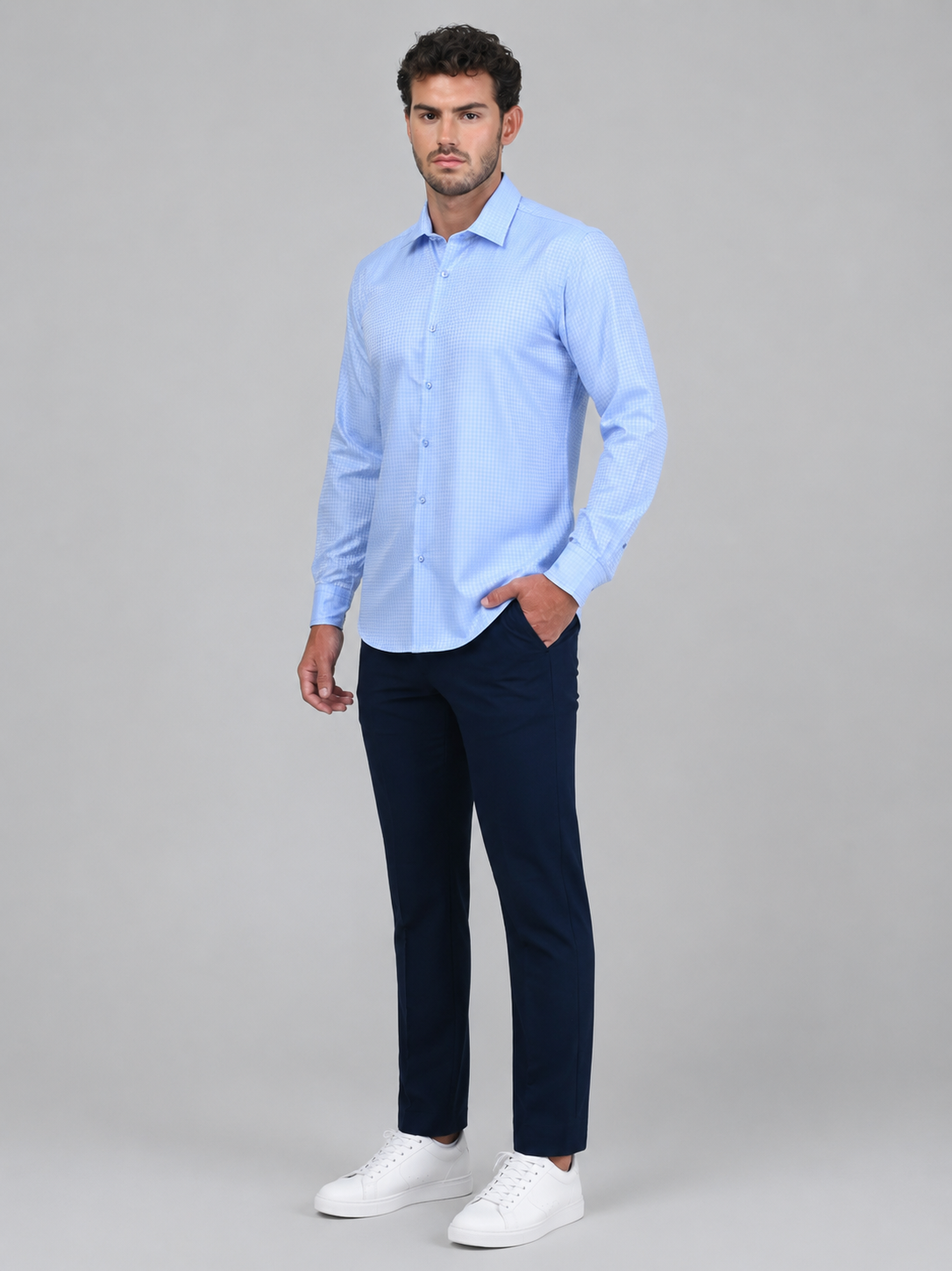 Full-length model wearing the Marshall Menswear Belgrave Light Blue men's smart casual shirt with navy trousers, for a polished smart casual look.