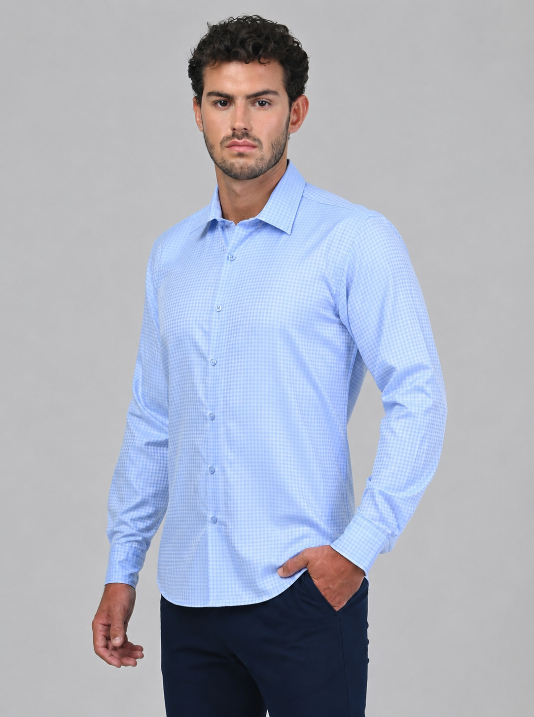 Three-quarter view of the Marshall Menswear Belgrave Light Blue men's smart casual shirt showcasing a subtle micro-check design, tailored silhouette and refined everyday style.