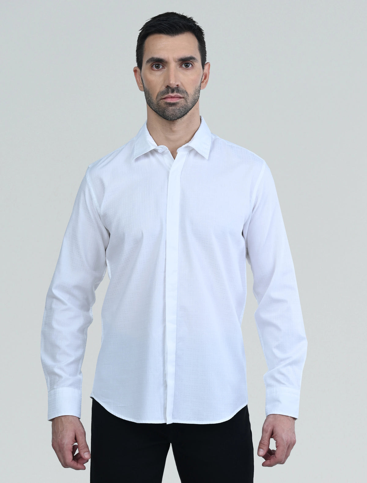 Model wearing the Marshall Menswear Lucien White men's casual shirt , highlighting breathable fabric and a smart casual look.