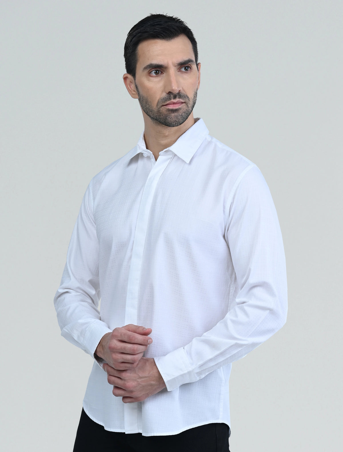 Front view of the Marshall Menswear Lucien White men's shirt featuring breathable  fabric, a spread collar, long sleeves and a tailored fit for effortless smart casual style.