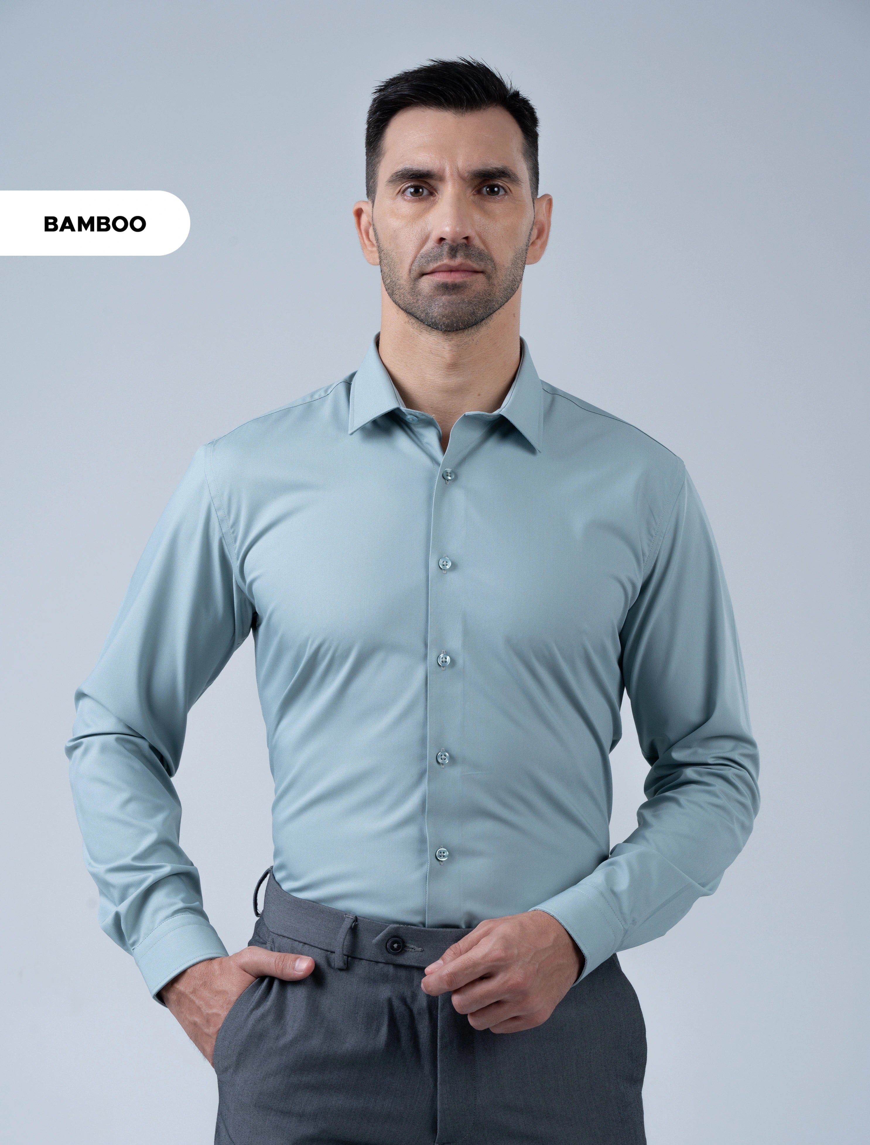 Marshall Menswear Bromley sage green men's bamboo shirt styled with grey trousers, a refined business shirt for office and professional workwear