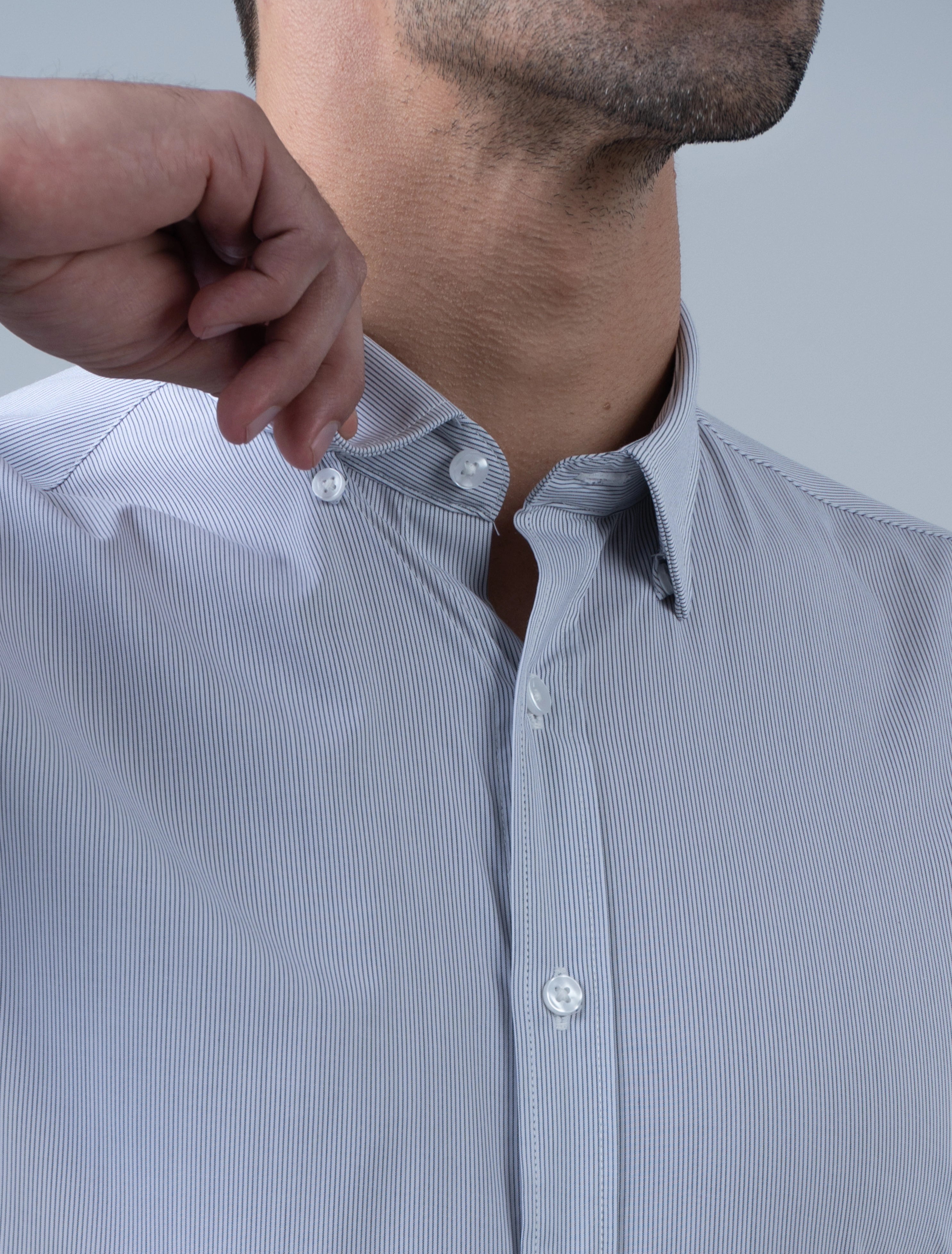 Hartwell pale grey stripe men's business shirt close-up showing hidden button collar detail for a neat and polished professional office look.