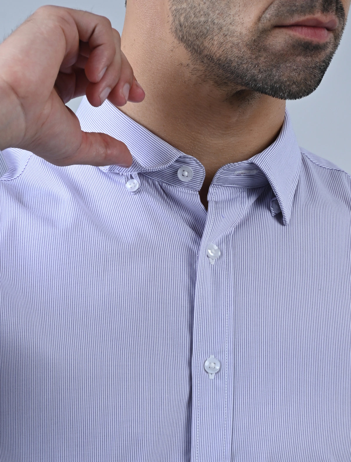 Hartwell lavender stripe men's business shirt close-up showing hidden button collar detail, designed for a neat and polished professional office look.