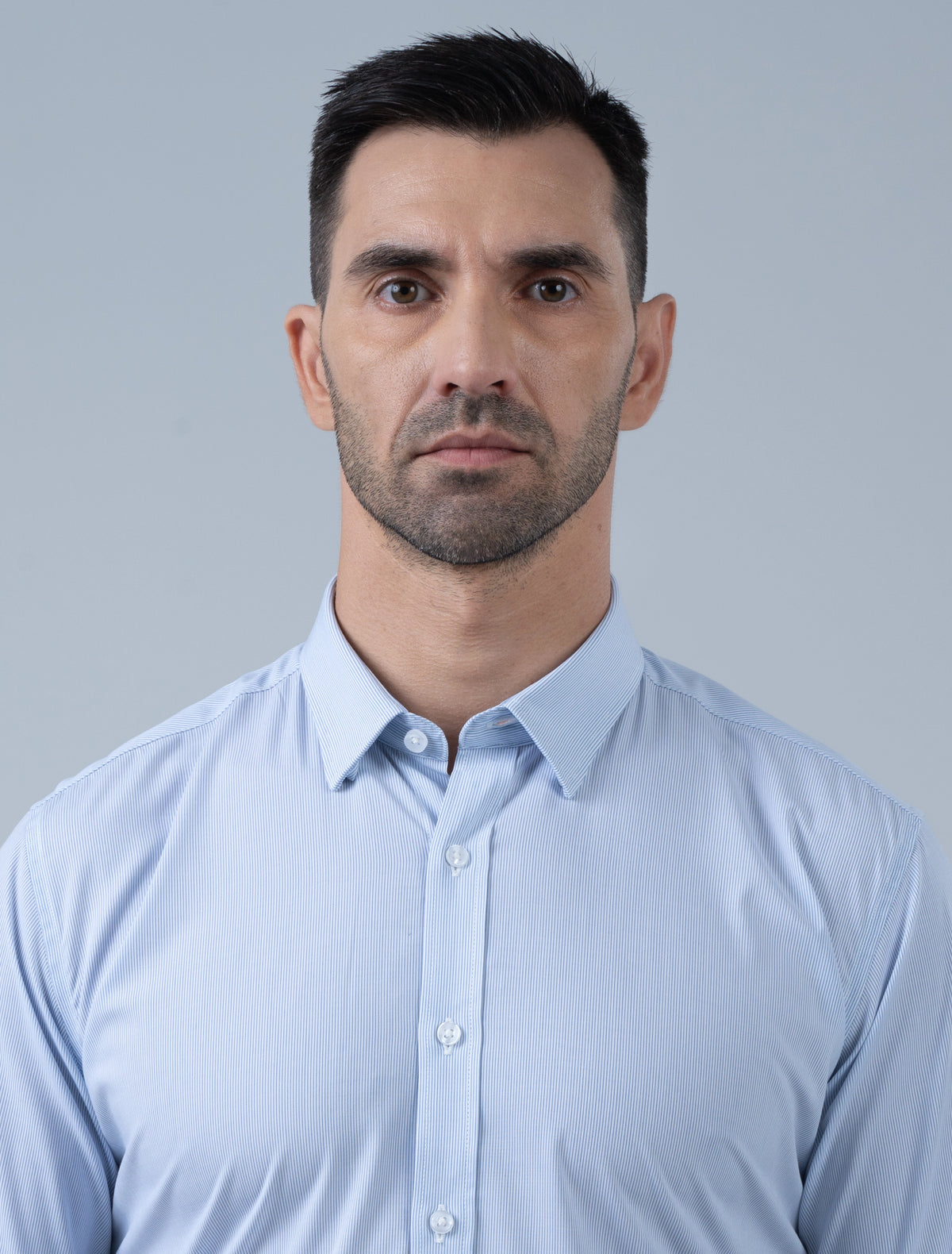 Marshall Menswear Hartwell blue stripe men's office shirt close-up featuring a crisp collar and fine stripe pattern for polished professional workwear.