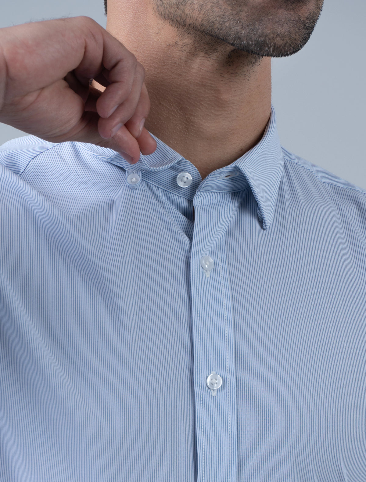 Hartwell blue stripe men's business shirt close-up showing hidden button collar detail for a crisp and polished professional office look
