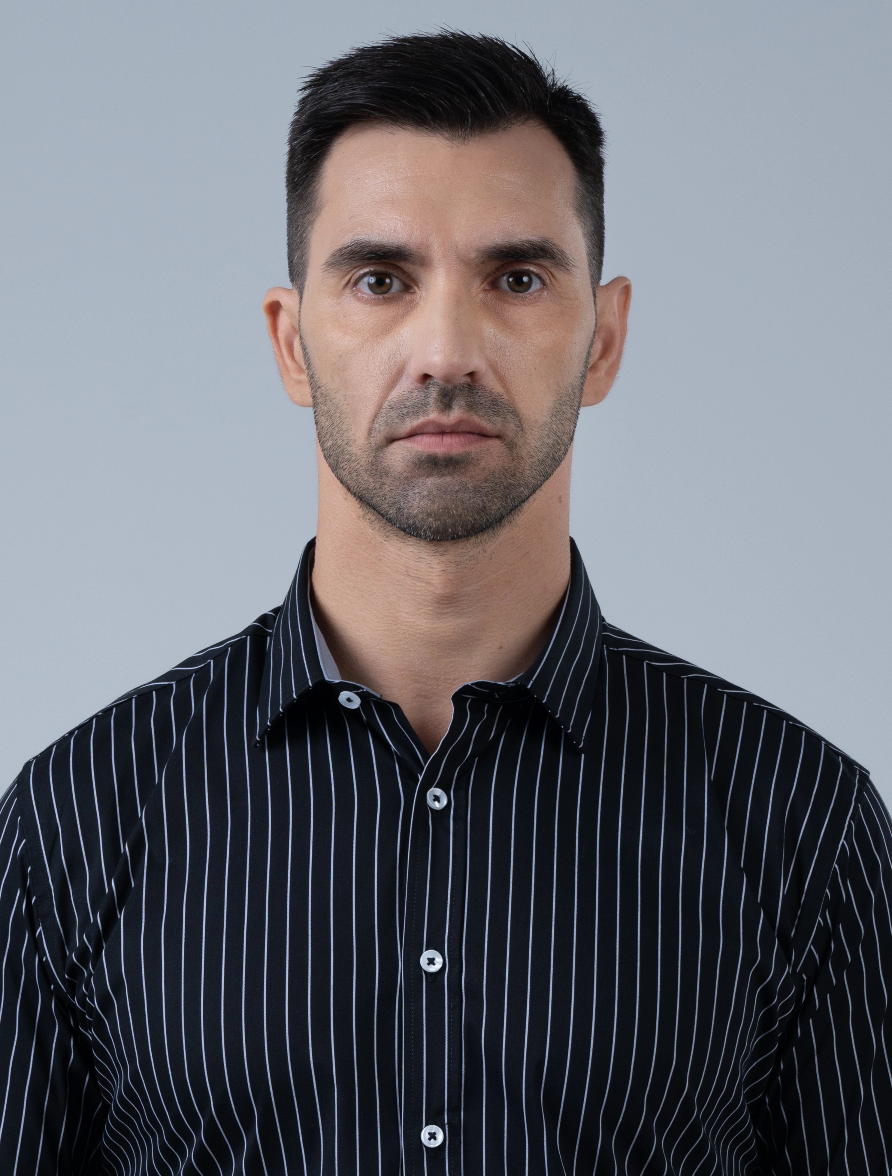 Marshall Menswear Kingsley black stripe men's shirt close-up with crisp collar, fine vertical stripes and refined detailing for elevated smart casual style.