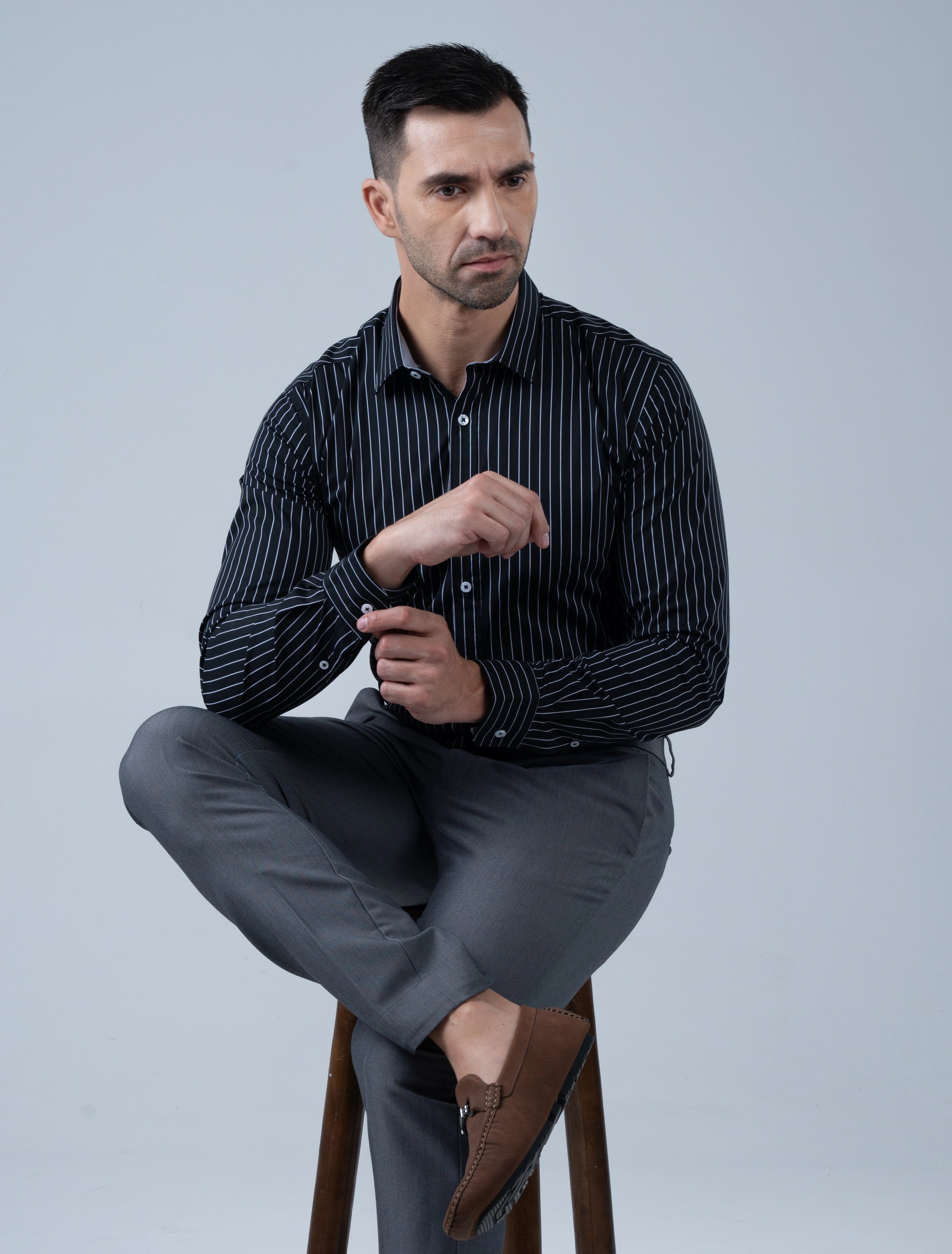 Men's black vertical stripe shirt by Marshall Menswear featuring a clean refined silhouette, designed for smart casual occasions and modern everyday wear.