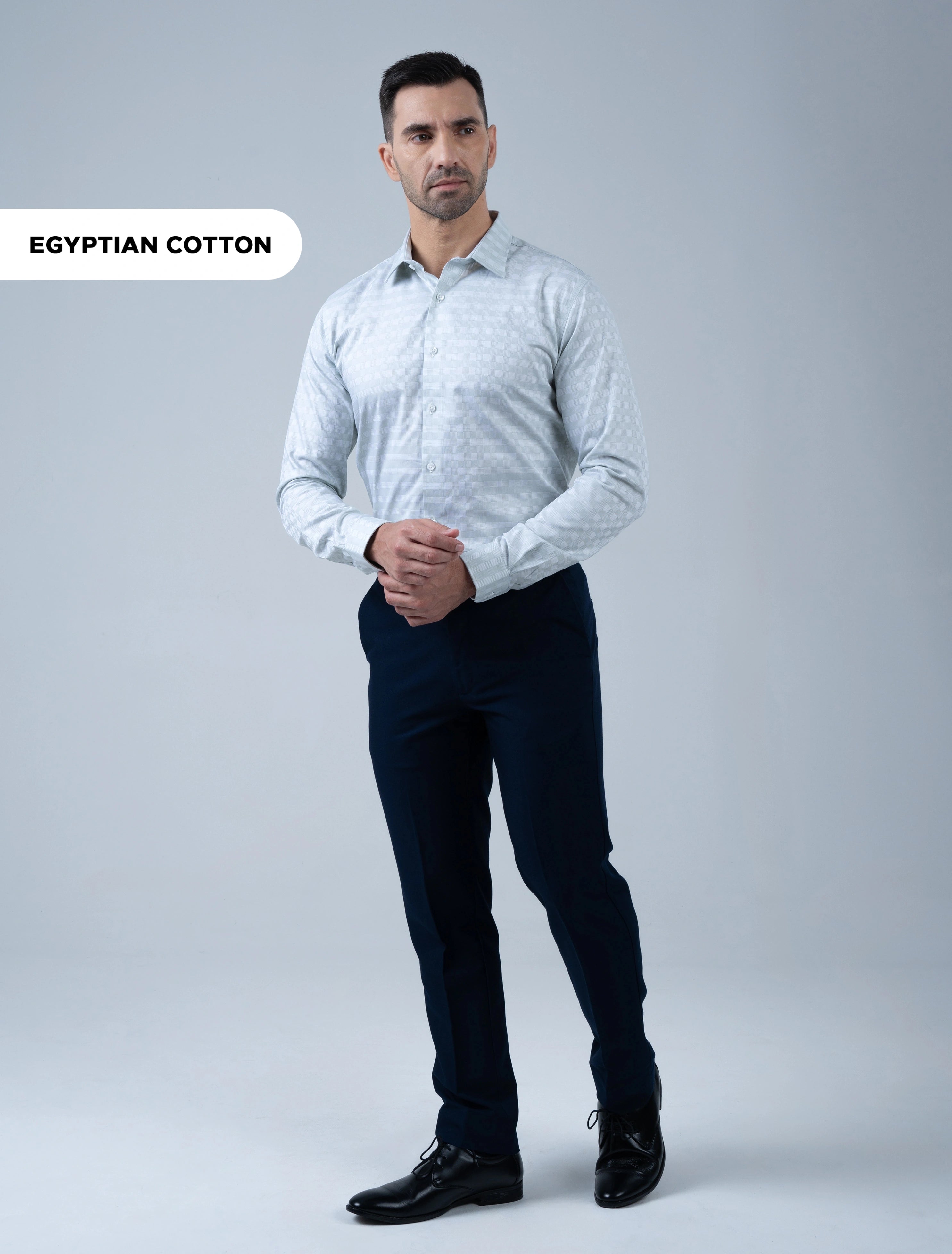 Marshall Menswear Marcello premium sage Egyptian Giza cotton men's office shirt styled with navy trousers and dress shoes for business and formal wear.