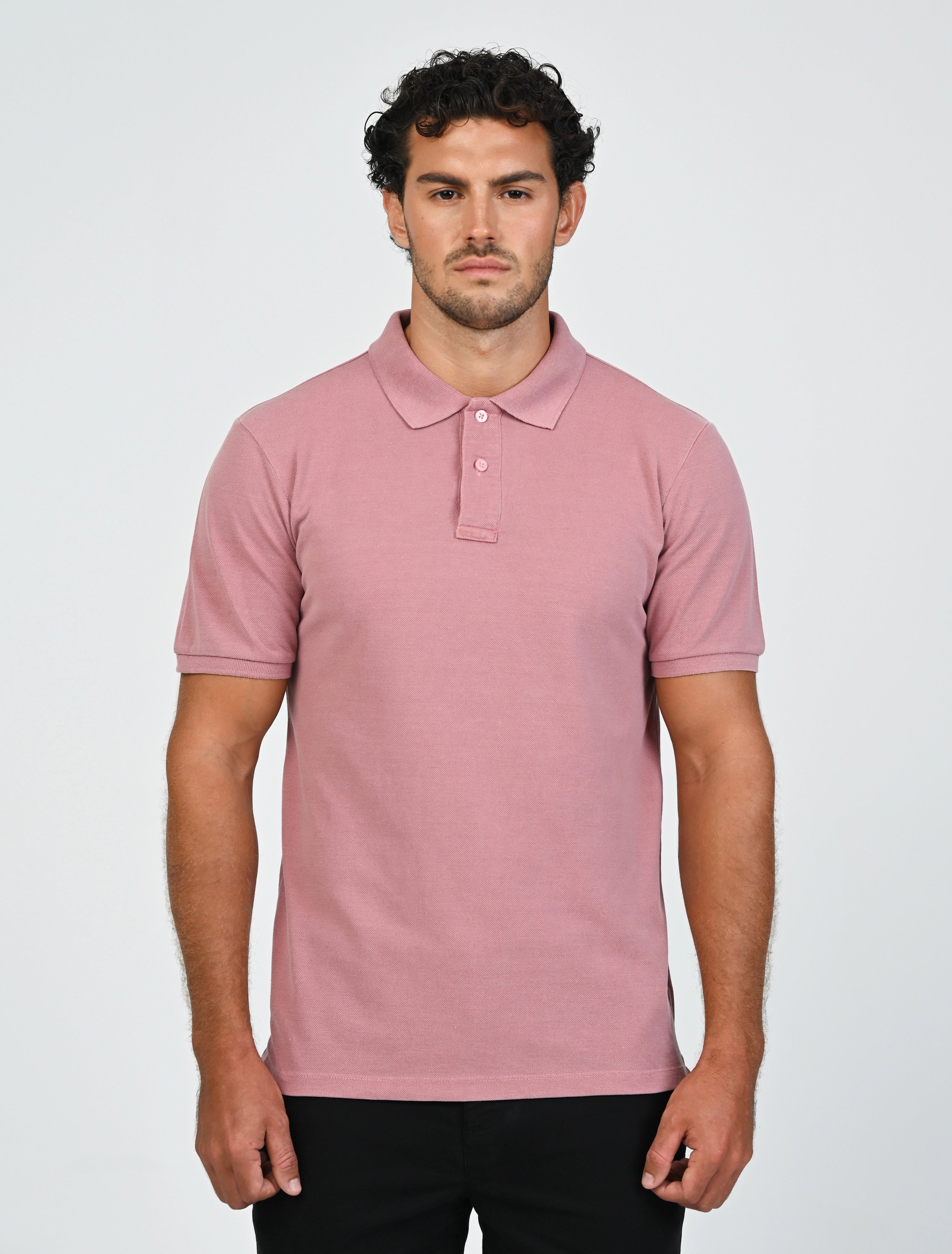 Marshall Menswear Atelier Salmon Pink men's polo shirt styled with black tailored trousers for a smart business casual office and weekend outfit.