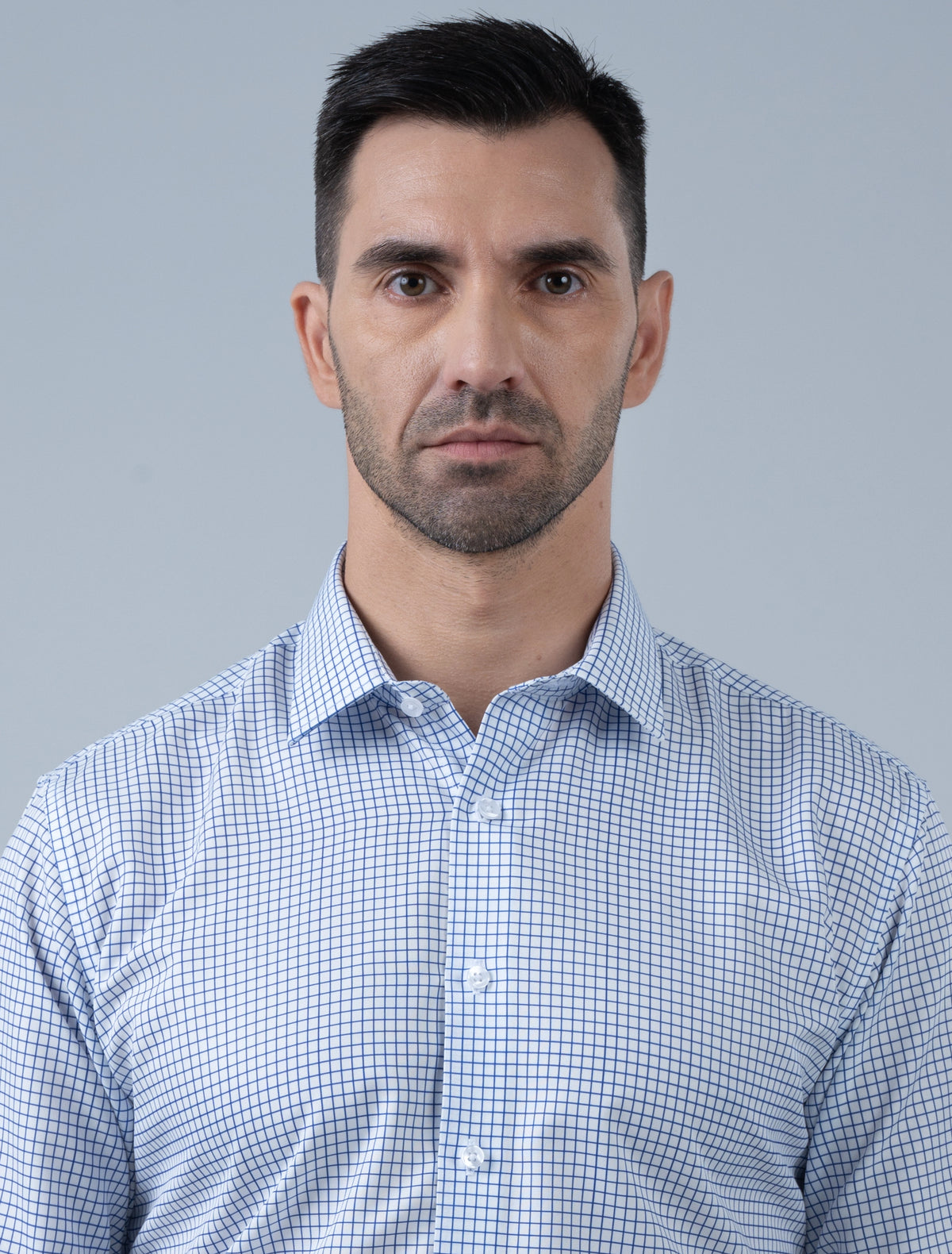 Close-up:
Marshall Menswear Wellington blue check men's business shirt close-up showing crisp collar and refined check pattern for professional office wear